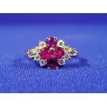 18 CT GOLD DIAMOND & RUBY RING WITH CIRCA 0.33CT OF DIAMONDS