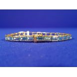 14CT GOLD - BLUE TOPAZ BRACELET