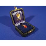 18CT GOLD, DIAMOND, RUBY & ENAMELLED FABERGE PENDANT IN ITS ORIGINAL BOX