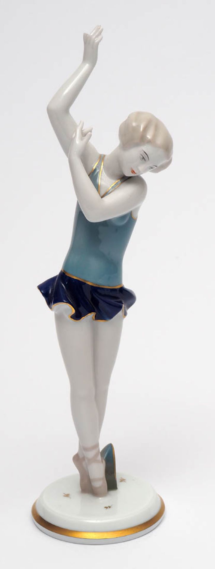 Figurine, Gustav Oppel für Rosenthal, 1928 Auf rundem Sockel Tänzerin in bewegter Haltung. Polychrom