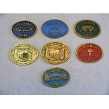 Collection of brass Plaques