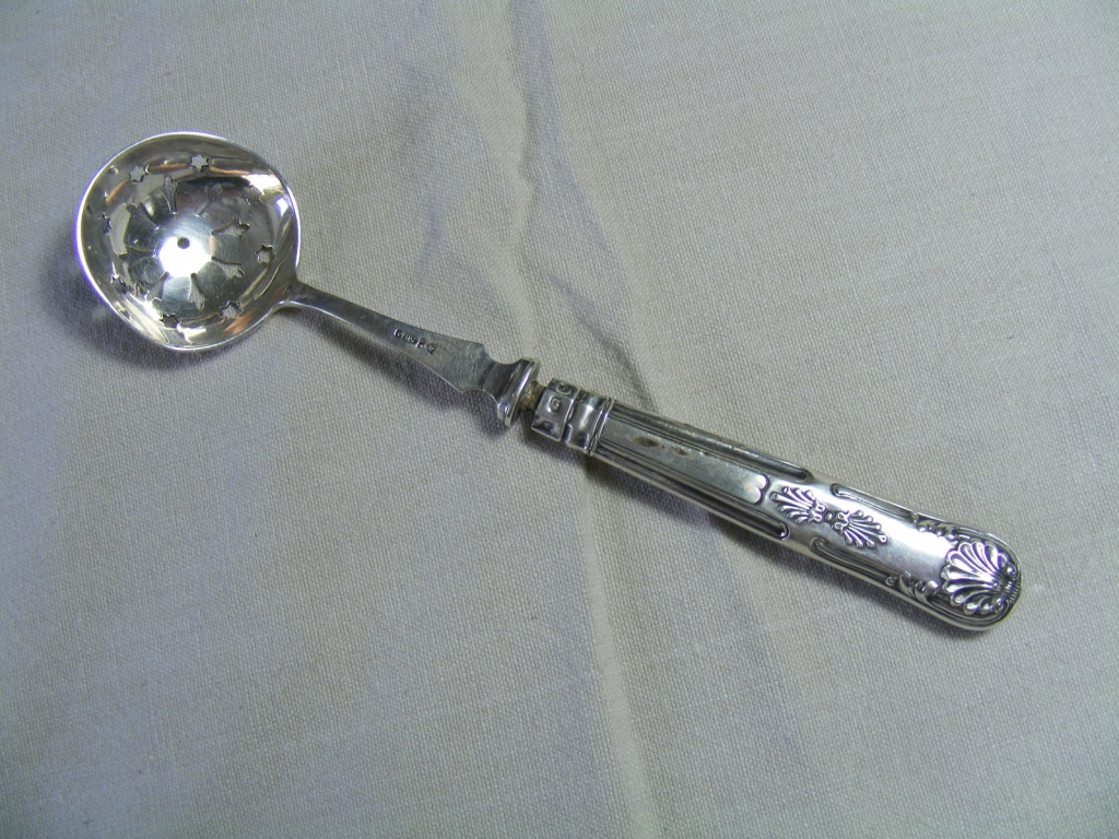 Edwardian silver-handled Strainer Spoon