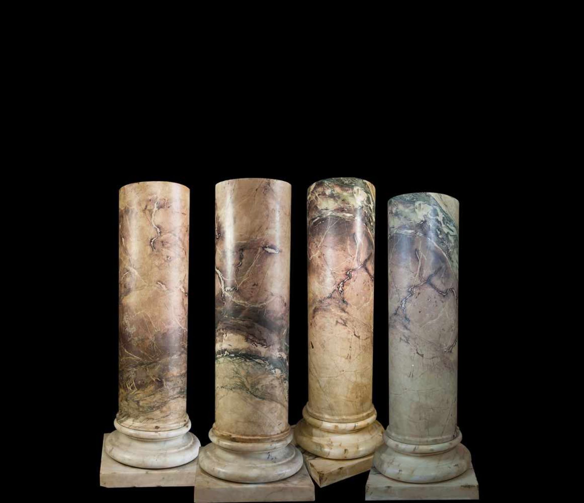 Four violet breccia columns 110x41x41cm.
