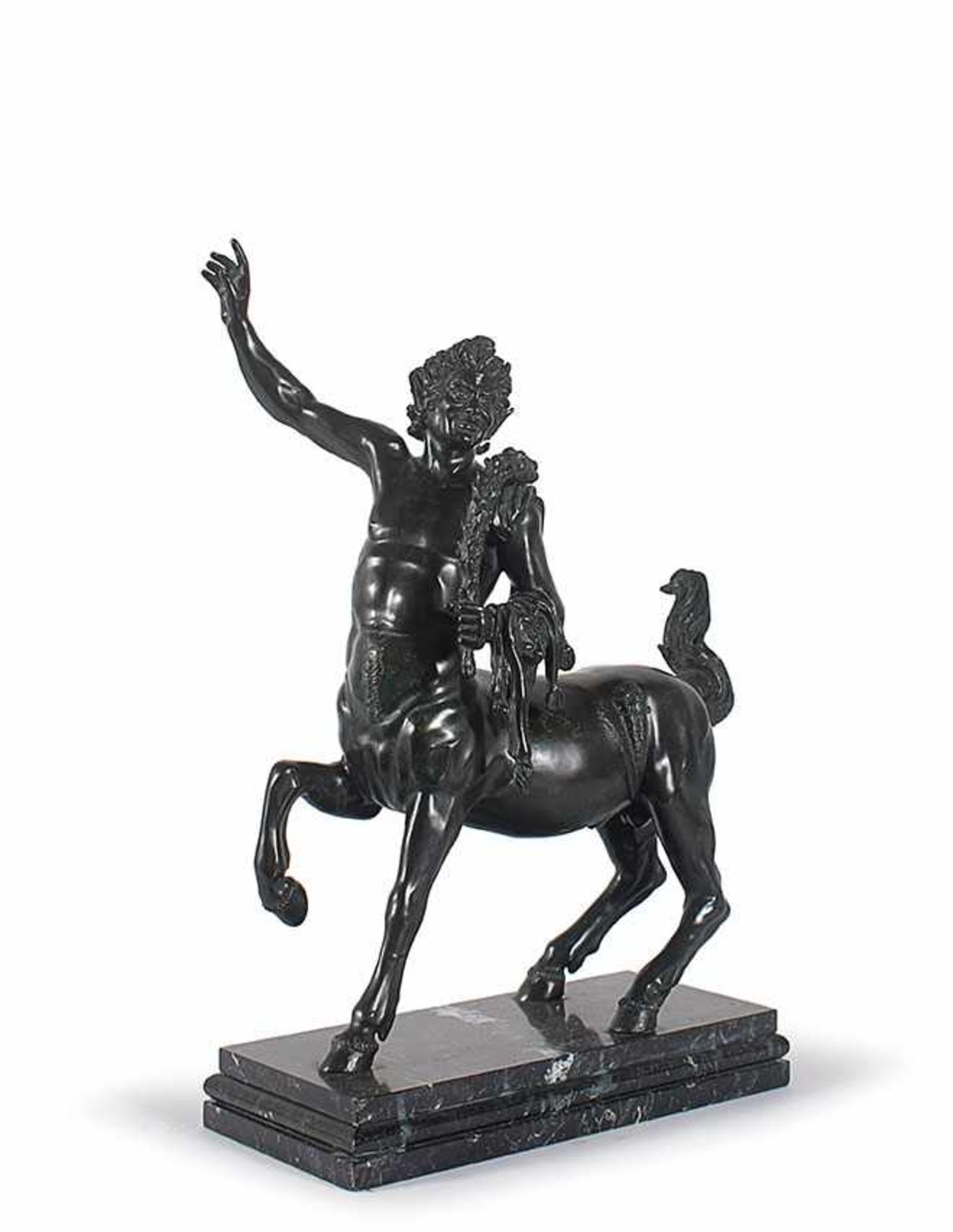 A patinated bronze sculpture of a young centaur 67x42x20cm.