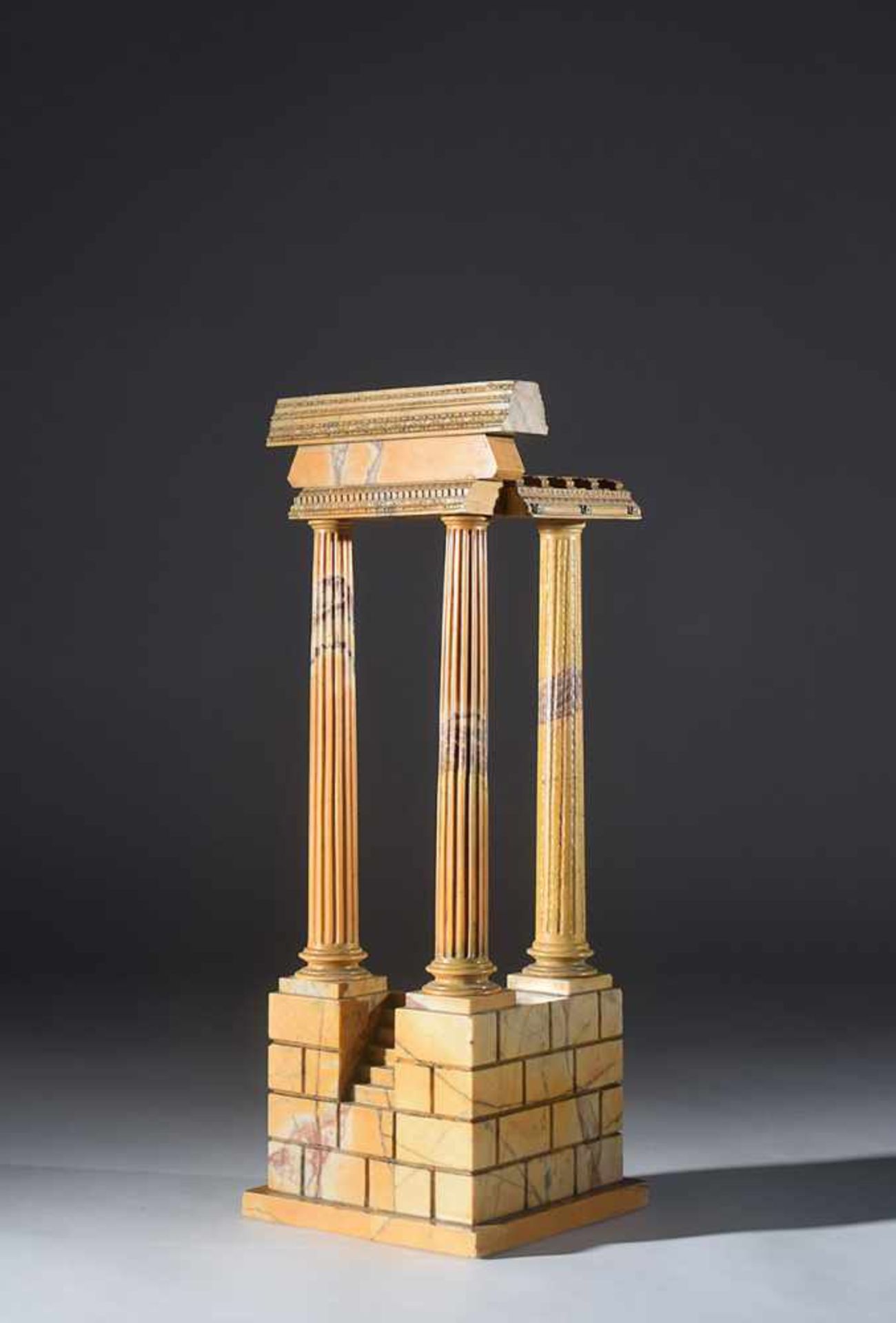 A Roman giallo di Siena model of a classical temple early 19th century, 49,5x19,5x15cm.