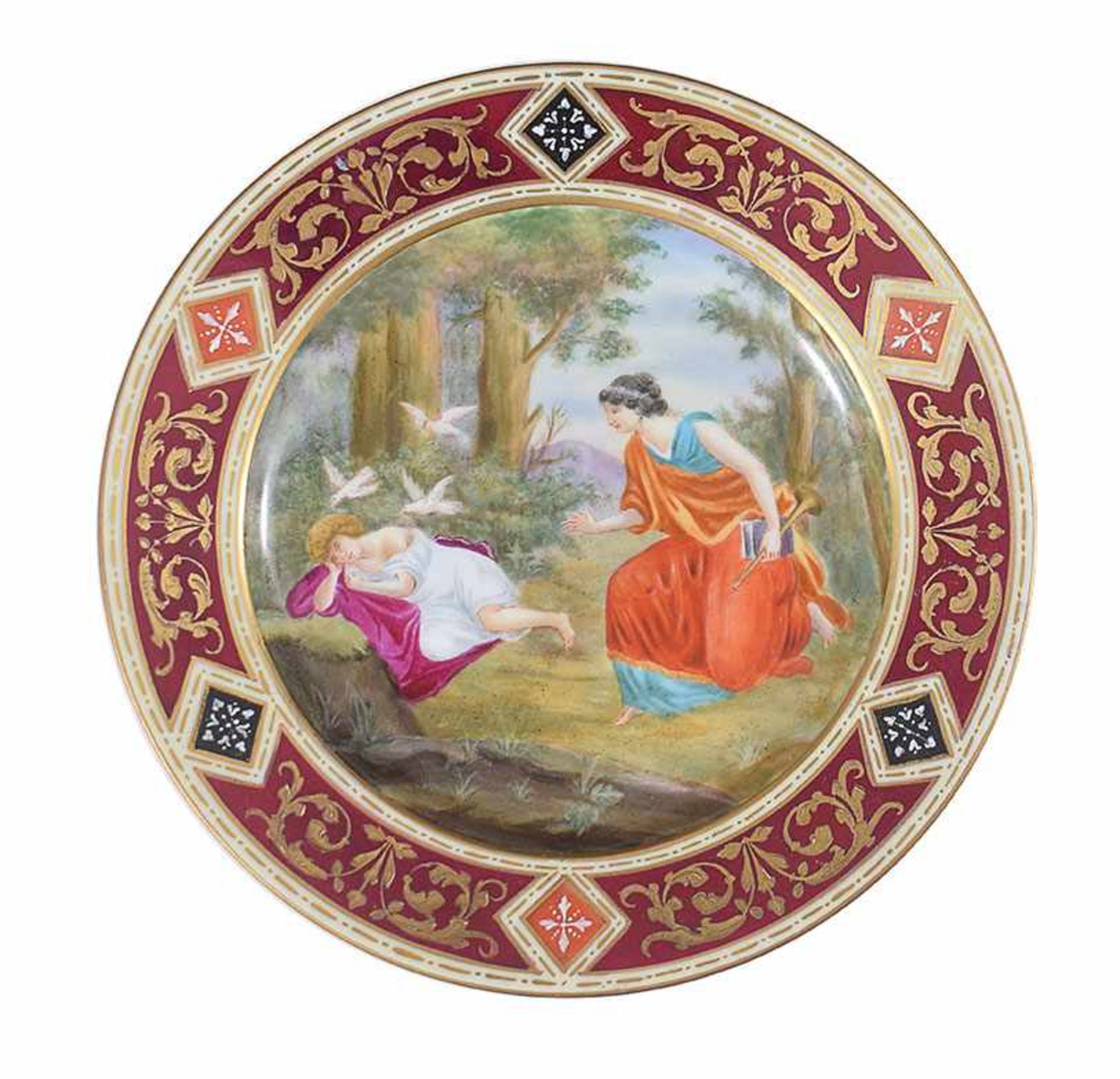 A Vienna polychrome porcelain dish 23,5cm. diam.