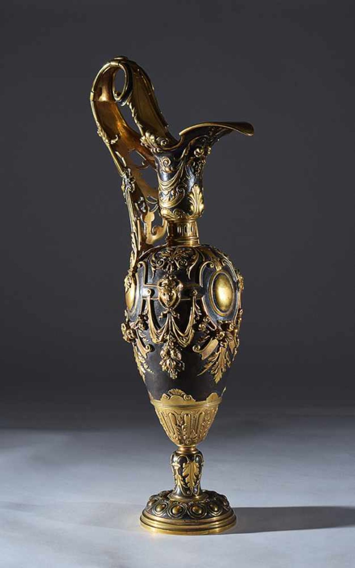 A large patinated and gilt bronze French spout 19th century, 70cm. high