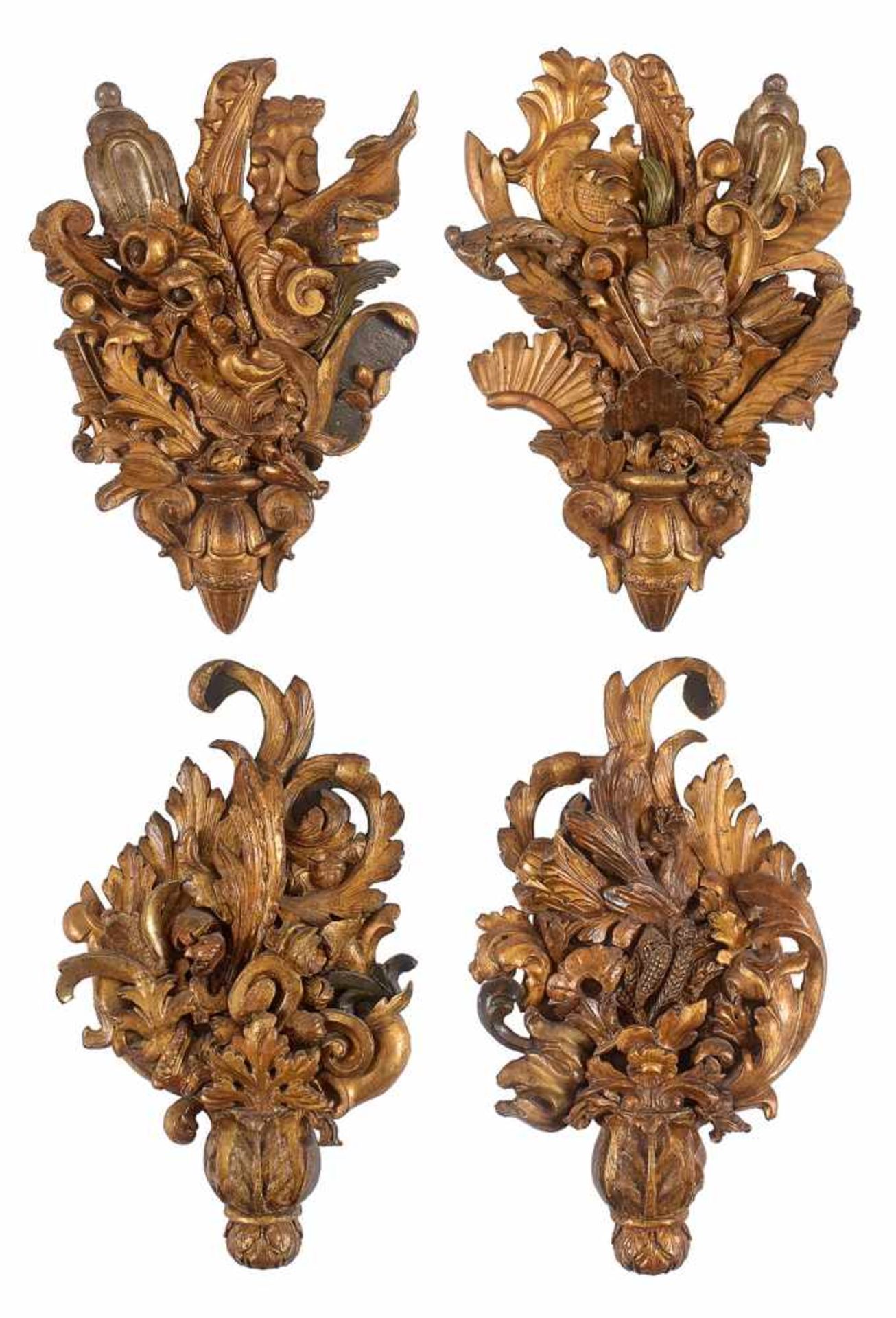 A set of four gilt and carved wood friezes 66x42cm.