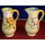 2 Clarice Cliff flower design jugs, 21cm tall