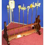 Ornate wooden display stand with 7 brass finial rods