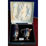 Chester silver sugar shaker with cream jug by Reid & Sons Ltd, in original fitted case