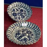 A pair of Slipware blue & white bowls