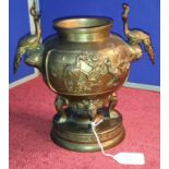 Oriental bronze censor pot with peacock bird design handles and panels on 4 pedestal legs, 23cm