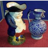 Victorian Staffordshire toby jug, 24cm tall, together with Westerwald German stoneware flagon jug