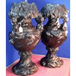 2 large heavy bronze vases with detail of 3 lady dancer figures holding the upper part of each vase,