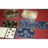 2 tubs of mixed world coins with bank notes, together with 5 cased coin sets