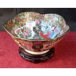 Chinese Famille Rose bowl on hardwood stand, 21cm diameter