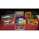 Selection of mixed bus models, together with 3 Dinky boxed models