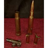 Three trench art shells together with 2 brass shells