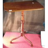 A Georgian flip top table with single pedestal supported by 3 legs, 72cm tall