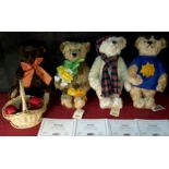 A collection of 4 seasonal Steiff bears with certificates