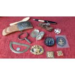 Selection of collectables to include, military badges, belt buckle coin holder& Jaguar style mascot