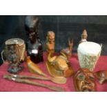 Selection of African carved busts, wall plaques, figures & drums