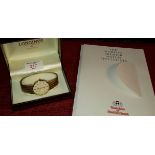 9ct gold Longines mens watch, with 9ct gold strap, with fitted box & original paper work of