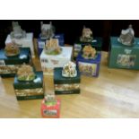 A selection of Lilliput lane houses with boxes