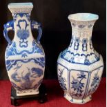 2 oriental blue & white vases