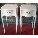 A pair of French style bedside cabinets with gilt trim
