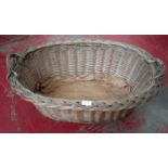 Antique weaved wicker laundry basket