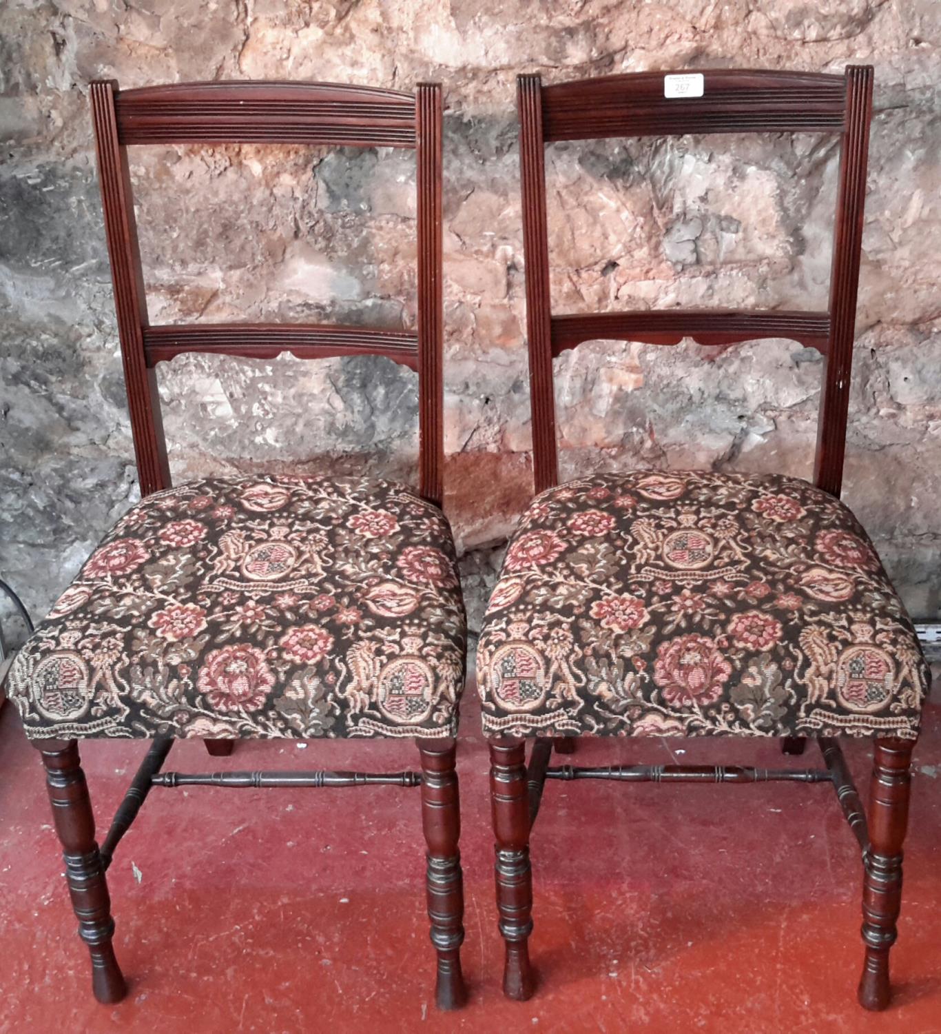 A pair of tapestry based chairs