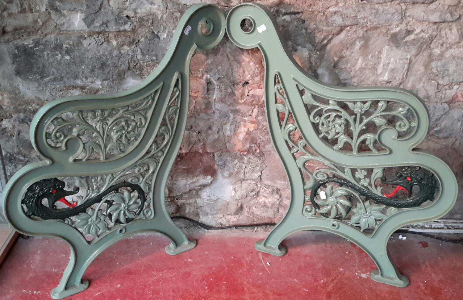 A pair of Georgian cast iron bench ends