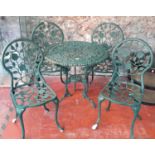 Cast metal green garden table & 4 matching chairs, Finished in a flower design.