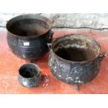 2 large cast metal cauldron planters & 1 other