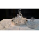 Crystal decanter with 6 matching glasses on silver plated serving tray, together with crystal basket