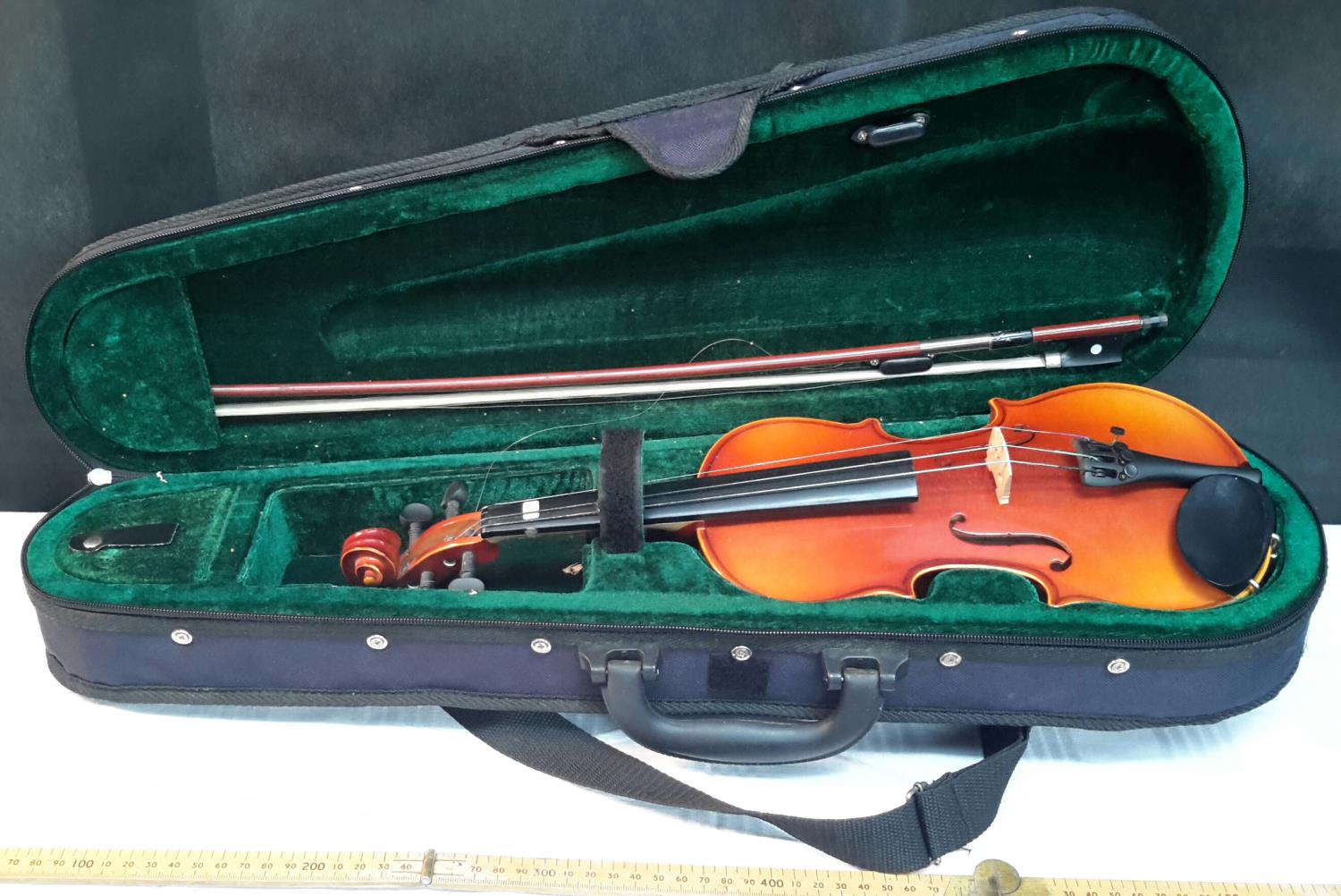 Petit violin with bow in fitted case