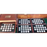 A case of 100 silver coins each weighing 66 grams ' The 100 Greatest Masterpieces 1st edition