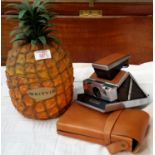 Retro Britvic pineapple ice bucket together with Polaroid SX-70 land camera & case