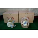 2 Nao girl figurines. 1 with doll & 1 with rabbit, both complete with boxes