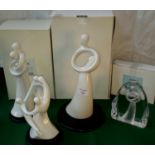 A collection of circle of love figures paperweights, complete with boxes