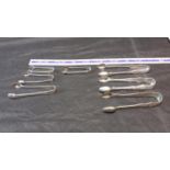 3 Sheffield silver tongs, 1 Birmingham silver tong & 3 silver plated tongs