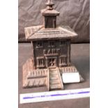 Vintage cast metal house money bank