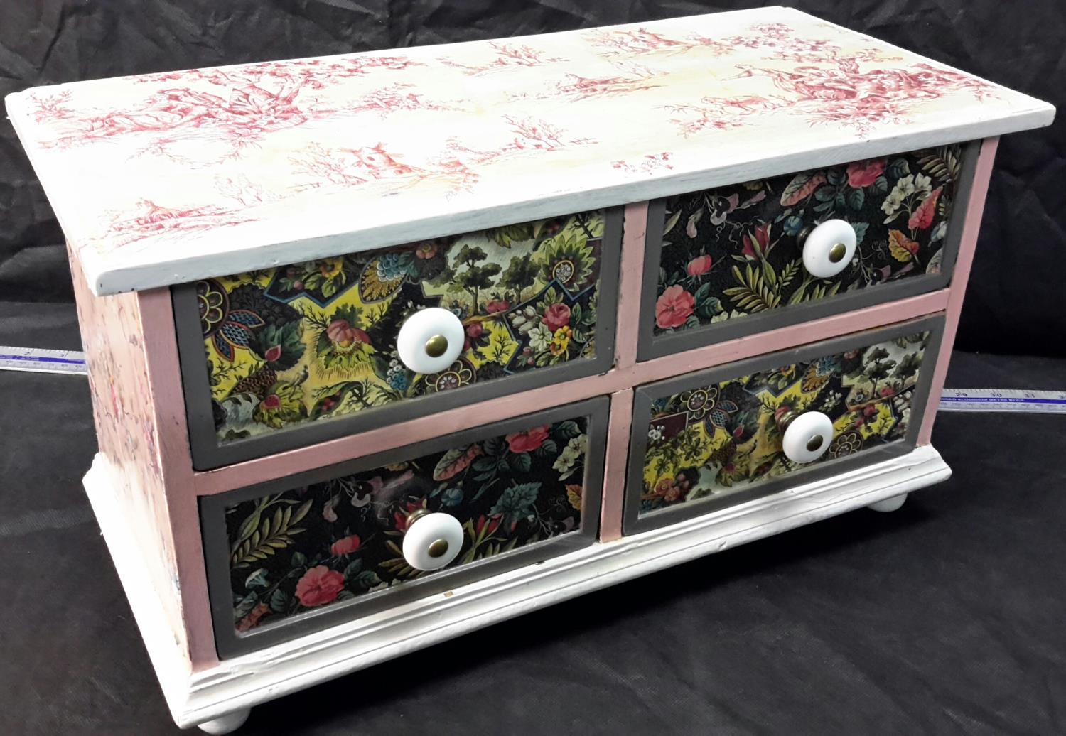 Small 4 drawer chest with wallpaper design