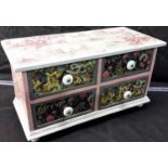 Small 4 drawer chest with wallpaper design