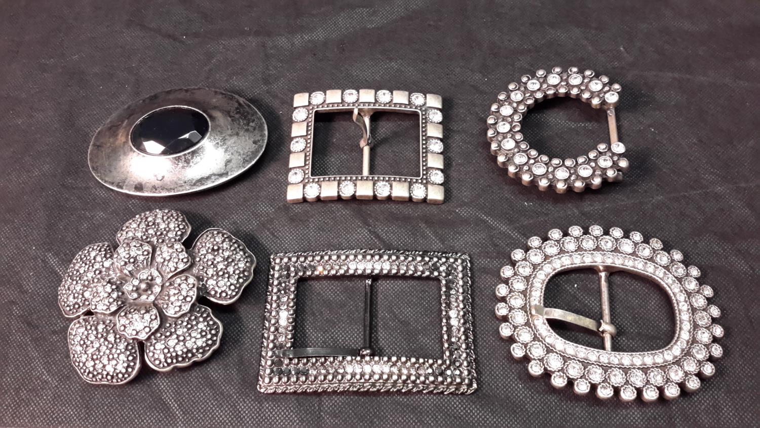 6 various belt buckles