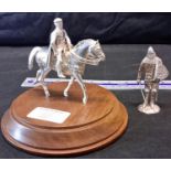 London silver heavy knight on horse upon a wooden display stand, together with a heavy silver knight