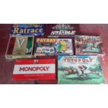 A collection of vintage games includes Monopoly & Totopoly etc