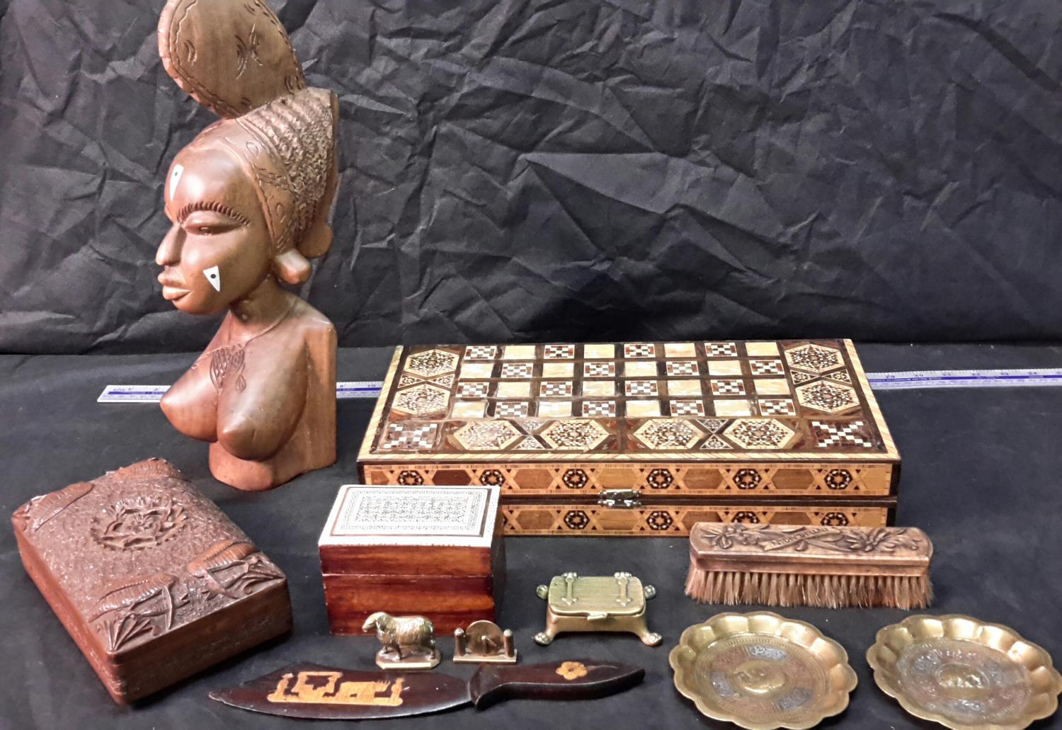 A selection of wooden collectables to include inlaid chess board, inlaid card box, large African